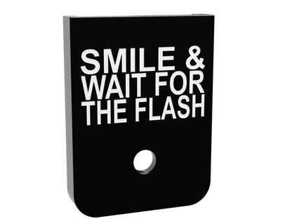 Smile & Wait For The Flash magazine base plate, double stack size, shallow white marking on black Cerakote